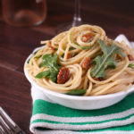 Pasta with Garlic Sauce, Arugula, and Walnuts